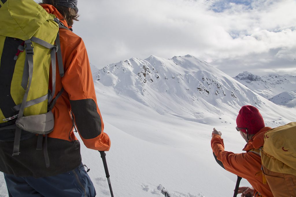Mountain guides deciding on their route, image by @Fredrik Schenholm