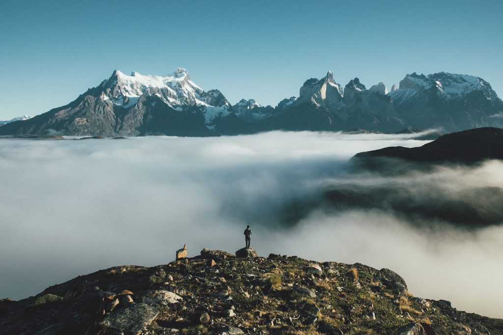 Mountain tops over the clouds, photo by Daniel Taipale