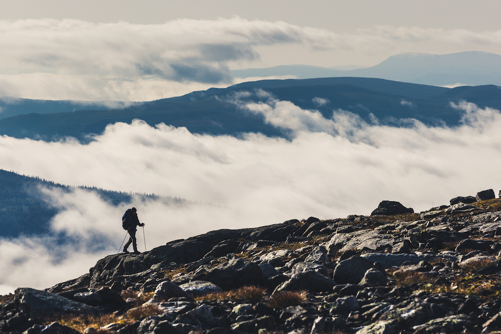 Hiking above the clouds in Sarek National Park.