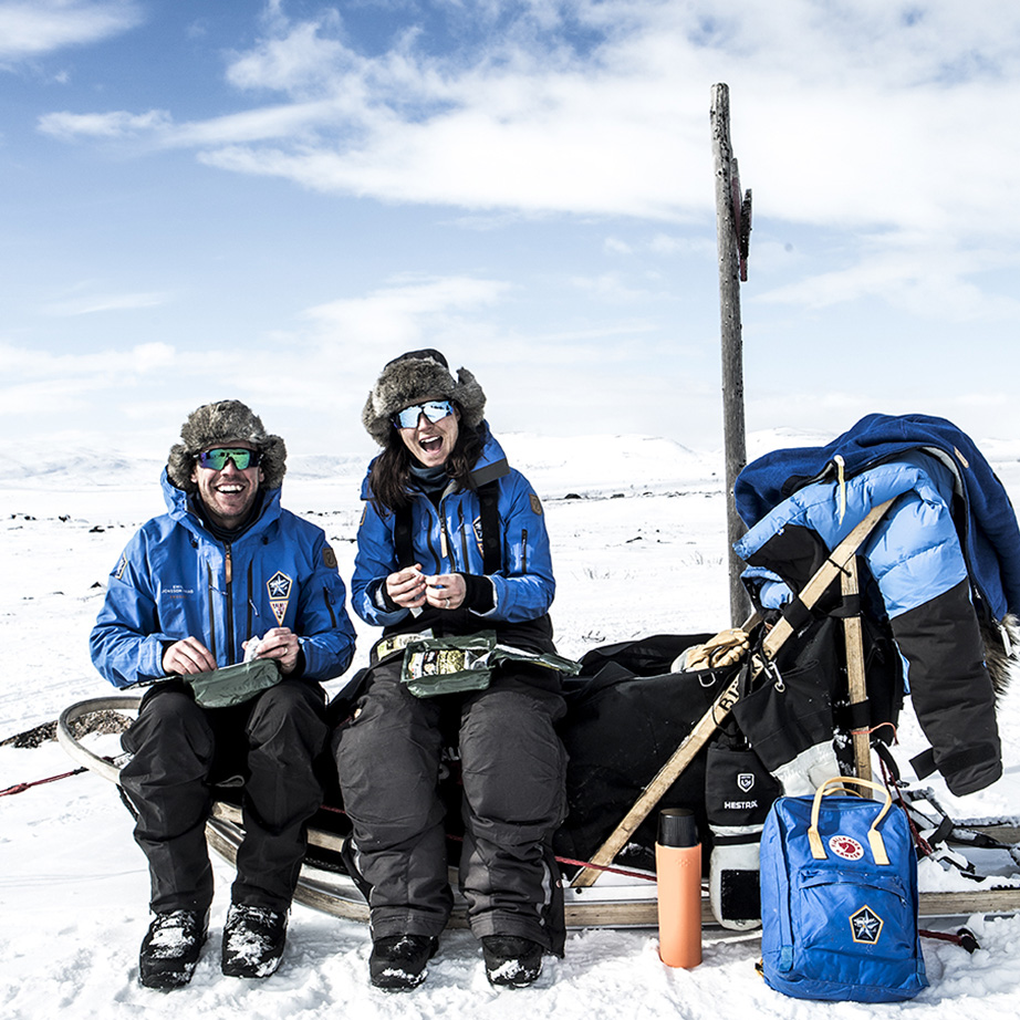 Participants of Fjällräven polar taking a break